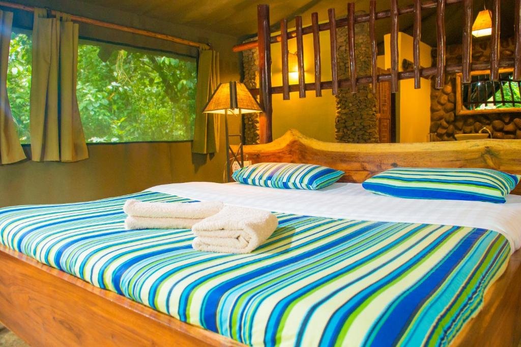 Kibale Forest Camp accommodation surrounded by forest